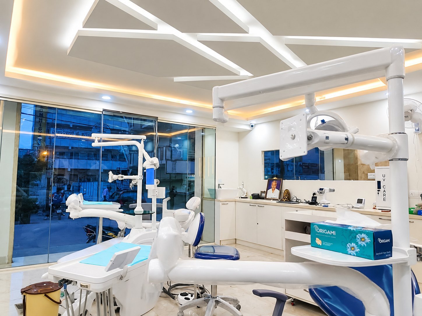 A Dental Fit treatment room, with two dental chairs and overhead lighting